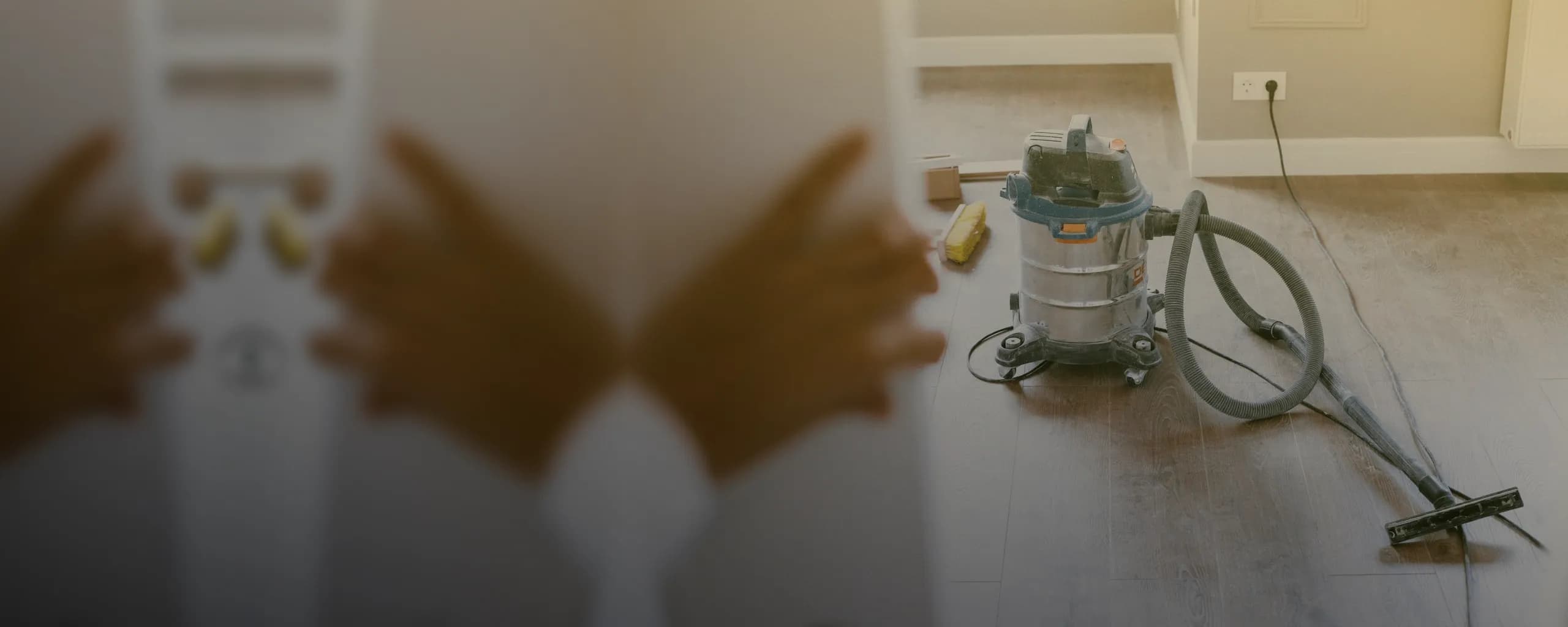 An industrial vacuum cleaner in a newly renovated flat